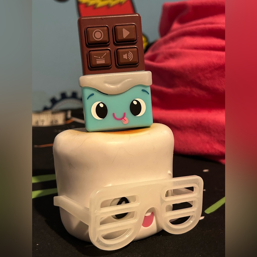 Chocolate themed recorder and music player with marshmallow toy